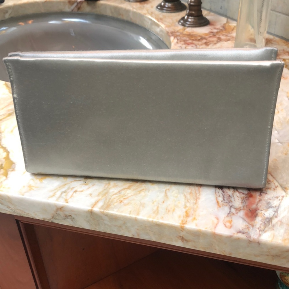 Small silver clutch bag